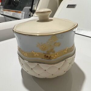 Elegant Gold and Cream Ceramic Canister